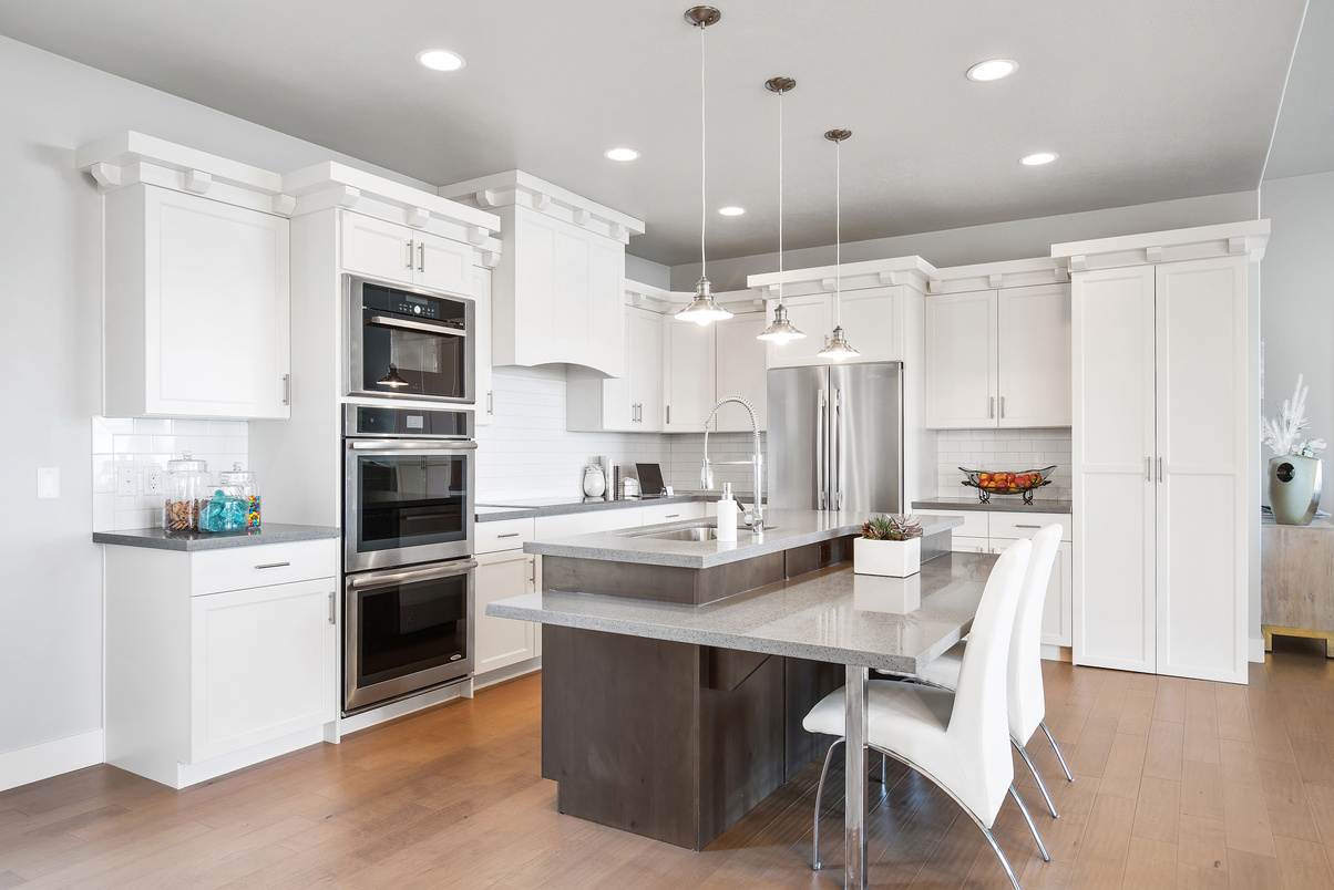 Spectacular gourmet kitchen with white cabinets